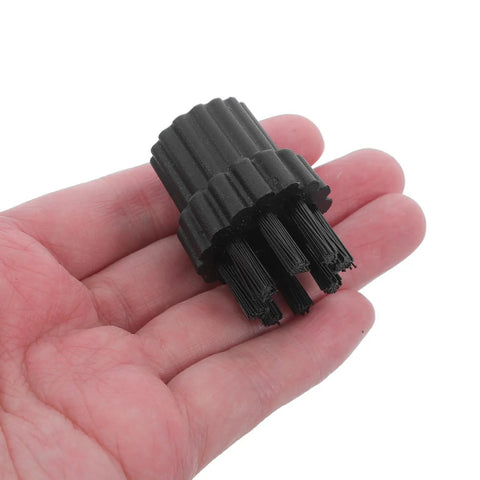 6 Piece Steam Cleaner Brush Head Replacement Kit With Durable Nylon Bristles quick swap brush head in a hand for deep scrubbing.