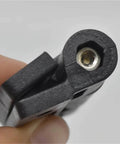 Close-up of 2 Pack Adjustable Torque Plastic Hinges Black Positioning Door Hinges 72x56x19mm held in hand, showing screw adjustment.