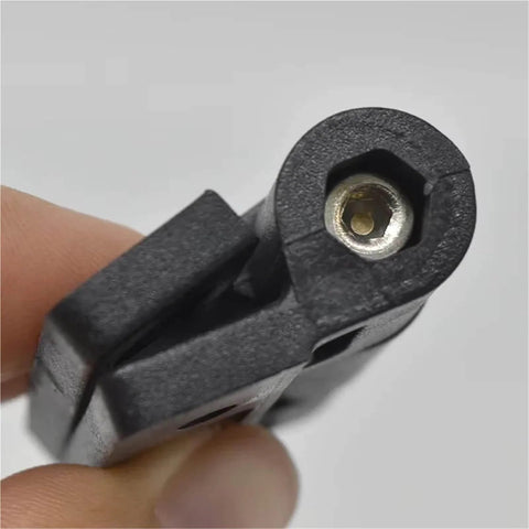 Close-up of 2 Pack Adjustable Torque Plastic Hinges Black Positioning Door Hinges 72x56x19mm held in hand, showing screw adjustment.