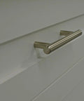 Brushed Gold T-Bar Cabinet Pulls 4 Pack Modern Hollow Drawer Handles Kitchen Hardware installed on a white cabinet door