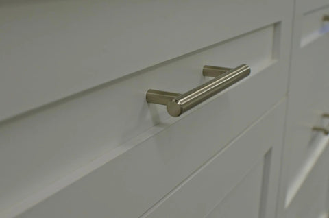 Brushed Gold T-Bar Cabinet Pulls 4 Pack Modern Hollow Drawer Handles Kitchen Hardware installed on a white cabinet door