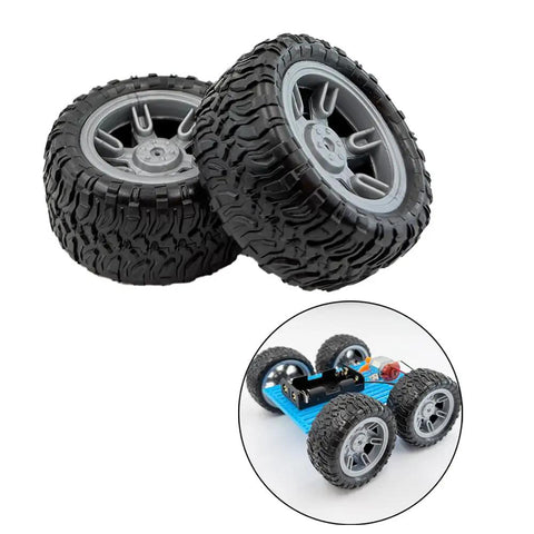 Four Pack Toy Car Wheels With Rubber Tires And Metal Shafts For RC Cars Trucks Boats Drones Robots Helicopters DIY Model Building Parts 60mm Diameter 28mm Wide Wheels And 3mm Shafts shown with two wheels and a model chassis