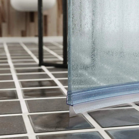 Frameless Shower Door Bottom Seal With Drip Rail For Glass Doors Twenty Seven Point Five Inch Long Sweep Tough Seal Strip To Stop Leaks And Drips Ideal For Pull Push Doors installed on tiled floor.