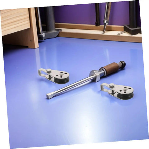 Two Heavy Duty Marine Pulley Blocks Four Pack With Stainless Steel Bearings For Kayak Hoist And Sailing Rigging Rope on a workbench.