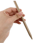 Hand holding a stake from the Six-Piece Adjustable Camping Tent Pole Kit With Heavy-Duty Aluminum Stakes, Long-Lasting Pegs And Hammer