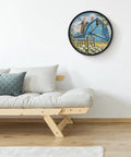 Dead Quiet Sweep Wall Clock With A Sweet Rural Blue Valley Warehouse Vibe Non Ticking Round Timepiece Battery Operated Design With Quick Install Brackets For Chill Home Office Classroom Spaces on a wall above a cozy sofa.