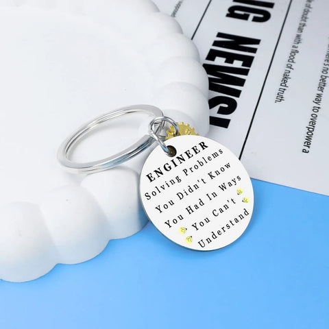 Engineering Keychain For Men, Dope Funny Gifts For Engineers, Graduation Gift For Him with text on a silver round key ring.