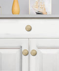 Rock Solid Heavy Duty Cabinet Knobs In Sleek Champagne Bronze Finish For Kitchens And Bathrooms 10 Pack on white drawers.