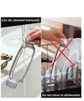 Heavy Duty Real Deal Butter And Cheese Slicer With Precision Stainless Steel Wires being hand washed, labeled as not dishwasher safe.