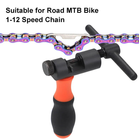 Bike Chain Breaker Tool Universal For 1 3 5 6 7 8 9 10 11 12 Speed Chains With Spare Replaceable Pin Heavy Duty Alloy Carbon Steel Chain Cutter For Road And Mountain Bikes Ergonomic Rubber Handle For No Fuss Breaks against chain background