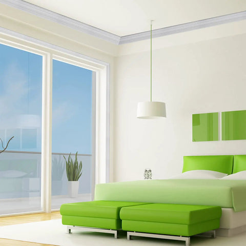 Bedroom with green decor featuring Peel And Stick 3D Crown Molding Foam Wall Border Self Adhesive Baseboard Trim White 2 Pack on ceiling.