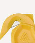 Close-up of Straight Up Film Safety Cutter with Recessed Stainless Steel Blade for precise box cutting in bright yellow.