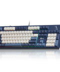 Full Size Gasket Mount Mechanical Keyboard With Wired Usb And Built In Windows Mac Switch Giving You A Smooth Typing Vibe That Truly Slaps For Heavy Productivity And Late Gaming Sessions, navy blue with white keycaps, side view.