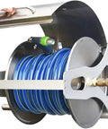 Kick Your Yard Game Up With This Heavy Duty Stainless Steel Retractable Garden Hose Reel Cart And 25 Meter Hose, shown from top with blue hose coiled.