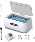 Ultrasonic Jewelry Cleaner 24W with 48kHz High Frequency Waves, open lid showing digital timer, surrounded by jewelry and accessories.
