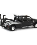One Sixty Fourth Scale Diecast Ford F 450 Super Duty Dually With Wrecker Bed Black Exclusive Model Truck rear side view