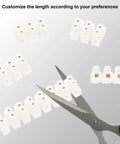 10 Piece Terminal Block Set With 12 Position Dual Row Barrier Strip Connector 10A 380V Flame Retardant PP Housing Self Locking Screws shown being cut with scissors for customization.