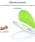 No Fuss Premium Durable Plastic Toilet Seat For Elongated Bowls Featuring Quick Swap Hinges Quiet Close Action Smooth Gliding Lid White Bathroom with green lid and baby in foreground.