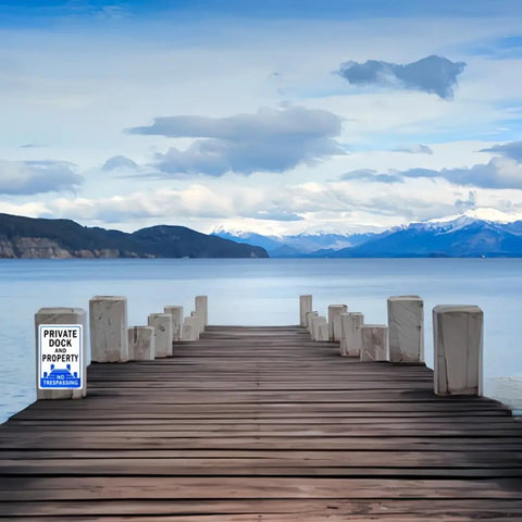 Real Deal Heavy Duty Reflective No Trespassing Sign For Private Dock 12X8 Inch Rust Proof Aluminum on wooden dock.