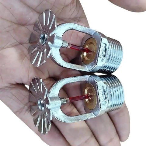 Quick Response Pendent Fire Sprinkler Head 155F Chrome Brass Half Inch Red Glass Bulb Parabolic Downward Spray Pattern held in hand