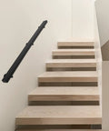 Heavy Duty Wall Mount Handrail And Matte Black Stainless Steel Grab Bar For Stairs on wooden steps for safe climbing.