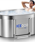 Man relaxing in XL 139 Gal Oval Ice Bath Tub Upgrade Portable Foldable Bath With Cover For Hot And Cold Plunge Recovery For Athletes