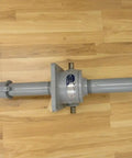 SK1912A Worm Gear Actuator Heavy Duty Built To Last Industrial Grade Linear Motion Unit For Automation, High Torque And Precise Positioning, Durable Gearbox, Easy Mounting For Robots, Conveyors, And Machinery. Gray metal worm gear actuator on wood floor, side view