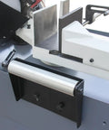 Close-up of Beefy Heavy Duty Metal Band Saw With 10 Inch By 7.9 Inch Cutting Capacity, 1.5 HP Motor, showing clamping mechanism.