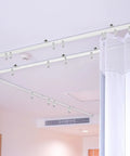 Bendable Ceiling Curtain Track System for Bay Windows and Room Dividers Flexible Curtain Rail Cut To Length White 9.8 Ft Easy DIY Install No Tools Required Ideal for Bunk Beds and Odd Shaped Windows ceiling mounted on a curved corner