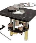 Professional Router Table Lift Featuring Spot On Crank Height Adjustment And Tight Reducing Rings For No Sweat Bit Changes On Your Home Shop Workbench With Precision Calibration top view showing height adjustment mechanism and metal rings.
