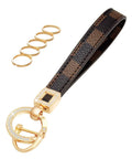 Dope And Totally Legit Premium Leather Wristlet Keychain Featuring Sparkling Crystal Diamonds And Classy Craft Pearls, Black leather and gold keychain with rings.