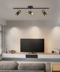 Living room with Three Light Black Track Lighting With Rotatable Heads GU10 Ceiling Spotlights For Living Room Hallway Studio Adjustable Indoor LED Spotlight Fixtures Now installed on the ceiling.