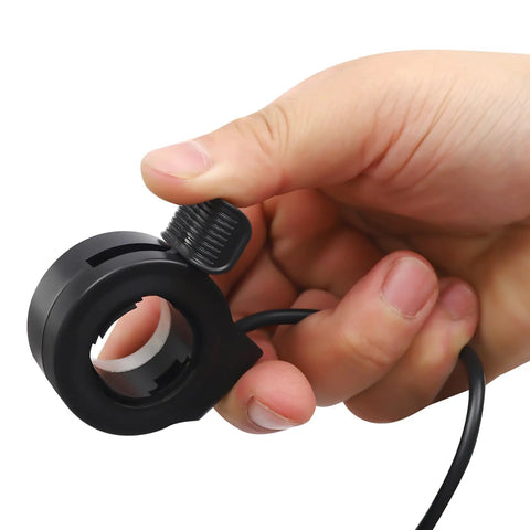 Hand holding thumb throttle from Boost Your Ride With A 1000W 20 Inch Rear Wheel Electric Bike Conversion Kit Equipped With PAS And LCD Display