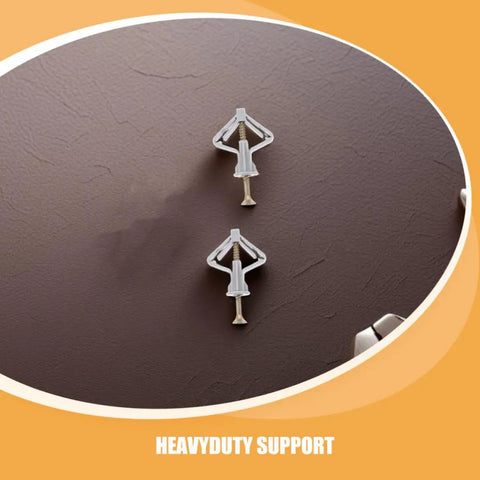 Two butterfly anchors from Heavy Duty Drywall Anchor Repair Kit With 50 Sets Of Butterfly Anchors And Screws For Hollow Walls