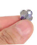 Level Up Your DIY Game With This Dope Bulk Lot Of Drilled Glass Spacer Beads Perfect For Jewelry Making Bracelets Purses And Chandelier Designs Grab These Fresh Bead Kit Today, showing a hand holding a faceted glass spacer bead.