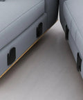 Close-up of Beefy 4 Piece Sectional Sofa Connector Brackets Black Iron Heavy Duty Couch Connecting Clamps on grey sectional