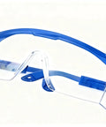 Clear Anti Fog Safety Specs With Protective Goggles For Industrial Use featuring blue durable frame and wraparound lenses