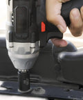 Using Three Eighths Inch Drive Metric Impact Socket Set, 26 Piece, on automotive part with 12mm socket