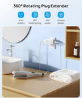 Super Sleek 4 Outlet Surge Protector With 360 Rotating Head And Space Saving Design White Power Strip Extender mounted on a wall.