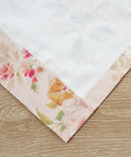 Close-up of Buttercup Floral Curtain Panel Set fabric with floral design and lining, 2 pack, window curtains, cozy home vibe.
