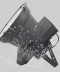 Heavy Duty Rechargeable Floodlight Churns Out Killer Glow With Ip66 Waterproof Seal Rock Solid Aluminum Build in the rain.