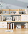 Wooden shelf with books and decor featuring Four Leaf Clover Cabinet Knob Set 15 Pcs Zinc Alloy Pulls Gold Finish Clover Handles.