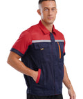 Men Heavy Duty Mechanic Uniform Short Sleeve Work Shirt Built Tough Contrast Utility Top With Safety Reflective Stripes Zip Front Drop Collar Red Navy Blue Job Site Staple worn by model, front view, featuring tool pockets.