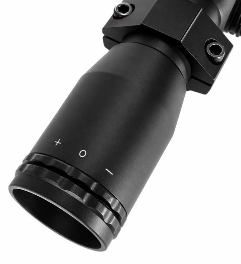 Close-up of Compact 4x32 Air Rifle Scope With Mil Dot Reticle For Crosman RepeatAir 1077 showing adjustment ring and matte black finish