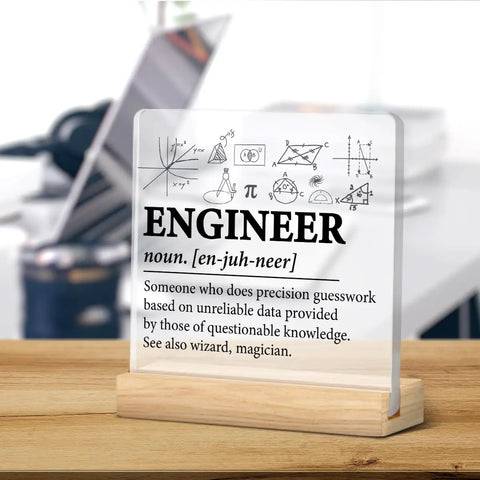 Engineer Definition Acrylic Plaque With Wooden Stand 4x4 Inch Square Cool Desk Sign Modern Clear Engineering Decor For Home Office Tabletop Gift Idea Perfect Gift For Any Desk on a wooden desk.