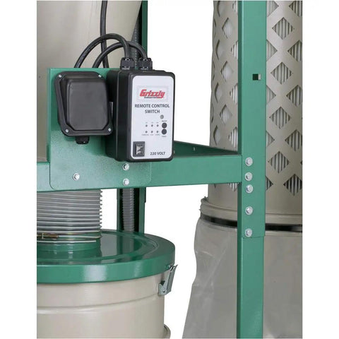 Heavy Duty 5 Horsepower Cyclone Dust Collector with remote control switch mounted on sturdy frame for easy operation.