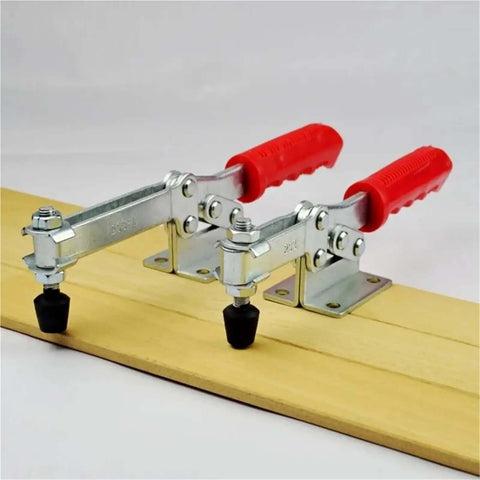 Two mounted Three Piece Heavy Duty Toggle Clamps With Horizontal Quick Release Locking Self Locking Lever System on wood surface