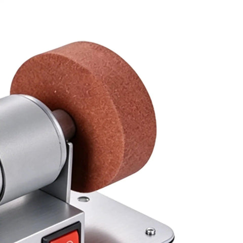 Powerful Mini Bench Grinder With 100W Brushless Motor Delivers Lightning Fast Six Thousand RPM Grinding Action with grinding disc.