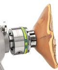 Pro Grade Four Inch Heavy Duty Wood Lathe Chuck Built Dang Tough With High Tensile Steel on wood piece with faceplate ring.