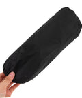 Black waterproof forearm cover held in hand, part of 2 Pack Genuine Oilproof Arm Sleeves Kick Grease To The Curb During Kitchen Grinds Or Yard Work.